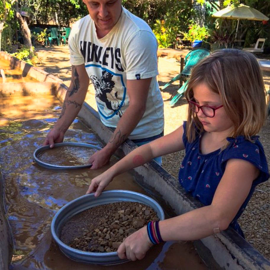 Visitors enjoying a fossicking experience